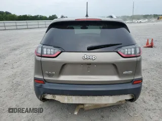 2019 Jeep Cherokee Latitude Plus with VIN 1C4PJMLB2KD169934, listed as a Copart auction lot 57332795 with 110,549 mi miles and Salvage title. Bid and sale history available at DreamBid. Image 6.