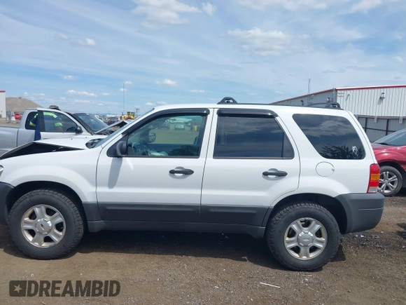 2006 Ford Escape XLT with VIN 1FMCU93106KA36063, listed as a IAAI auction lot 42610043 with 193,703 mi miles and . Bid and sale history available at DreamBid. Image 14.