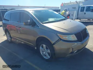 2013 Honda Odyssey Touring with VIN 5FNRL5H96DB066008, listed as a IAAI auction lot 41734055 with 120,292 mi miles. Bid and sale history available at carsss.com. Image 1.