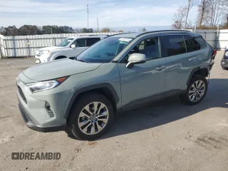 2020 Toyota RAV4 XLE Premium with VIN 2T3C1RFV6LW059183, listed as a Copart auction lot 85281574 with 91,402 mi miles and Salvage Title. Bid and sale history available at carsss.com. Image 1.