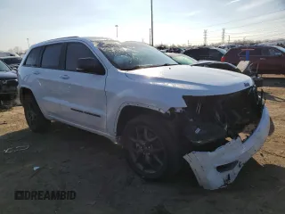 2021 Jeep Grand Cherokee 80th Anniversary with VIN 1C4RJFBG6MC674921, listed as a Copart auction lot 49873555 with 52,668 mi miles and Salvage Title. Bid and sale history available at DreamBid. Image 4.