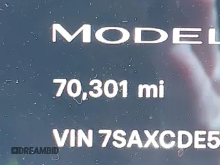 2022 Tesla Model X with VIN 7SAXCDE58NF342776, listed as a IAAI auction lot 42042369 with 70,301 mi miles and . Bid and sale history available at carsss.com. Image 15.