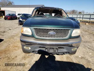 1999 Ford F-150 с VIN 1FTRX18W7XNA31048, выставлен на аукционе Copart как лот 87051164 с пробегом Не указан миль и Списание • Salvage title. История ставок и продаж доступна на DreamBid. Изображение 5.