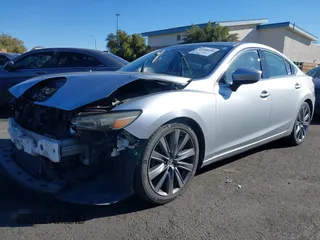 2018 Mazda 6 Grand Touring with VIN JM1GL1TY0J1306768, listed as a IAAI auction lot 41744640 with 81,798 mi miles and . Bid and sale history available at DreamBid. Image 20.