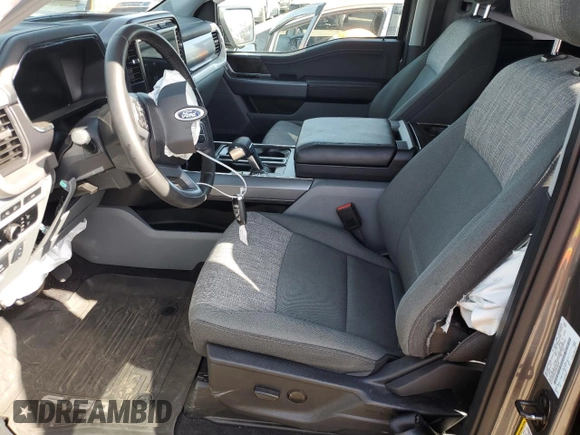 2023 Ford F-150 Lightning Pro z VIN 1FTVW1EL8PWG36508, wystawiony jako Copart lot #54178165 z przebiegiem 18 928 mil mil oraz Szkoda całkowita • Salvage title. Historia ofert i sprzedaży dostępna na DreamBid. Obrazek 7.