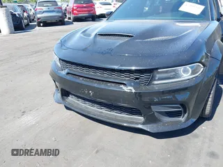 2019 Dodge Charger SRT Hellcat z VIN 2C3CDXL91KH749445, wystawiony jako IAAI lot #42300340 z przebiegiem 68 224 mil mil oraz . Historia ofert i sprzedaży dostępna na DreamBid. Obrazek 12.