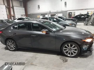 2020 Mazda 3 Premium with VIN 3MZBPBEM3LM123091, listed as a IAAI auction lot 41568213 with 68,515 mi miles and . Bid and sale history available at DreamBid. Image 14.