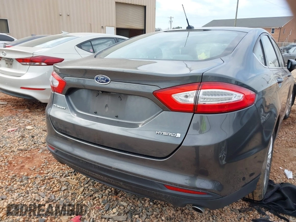 2015 Ford Fusion S Hybrid with VIN 3FA6P0UU7FR167229, listed as a IAAI auction lot 41684934 with 135,317 mi miles. Bid and sale history available at carsss.com. Image 16.