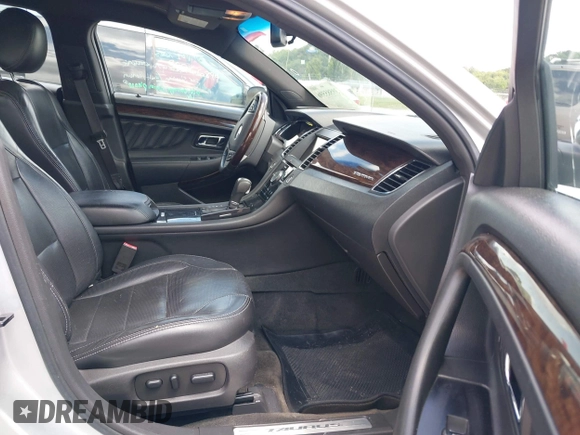 2013 Ford Taurus Limited with VIN 1FAHP2F8XDG117448, listed as a IAAI auction lot 39585596 with 150,747 mi miles and . Bid and sale history available at DreamBid. Image 5.