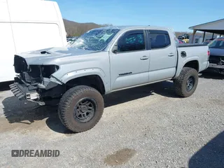 2020 Toyota Tacoma SR5 z VIN 5TFCZ5AN5LX229019, wystawiony jako IAAI lot #41907694 z przebiegiem 79 355 mil mil oraz . Historia ofert i sprzedaży dostępna na DreamBid. Obrazek 23.