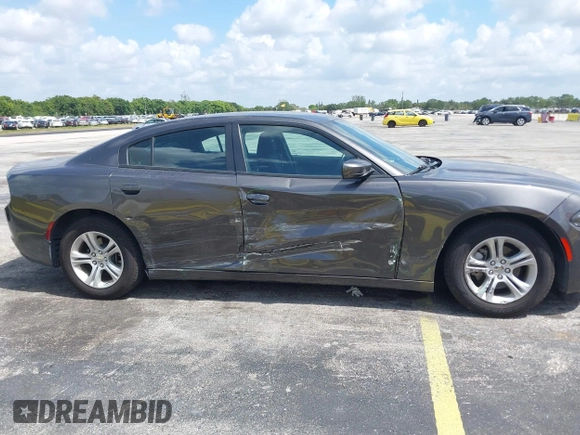 2022 Dodge Charger SXT with VIN 2C3CDXBG4NH248389, listed as a IAAI auction lot 42144728 with 54,132 mi miles and . Bid and sale history available at DreamBid. Image 13.