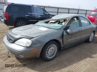 2001 Mercury Sable LS Premium with VIN 1MEFM55S71G632734, listed as a IAAI auction lot 42011855 with 211,402 mi miles and . Bid and sale history available at carsss.com. Image 2.