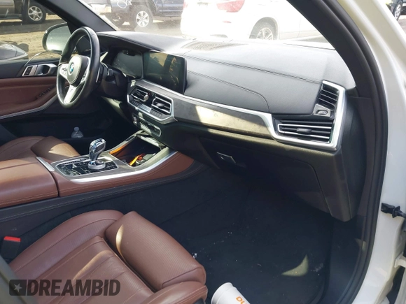 2020 BMW X5 M50i with VIN 5UXJU4C06LLE45651, listed as a IAAI auction lot 41618355 with 70,885 mi miles and . Bid and sale history available at DreamBid. Image 5.
