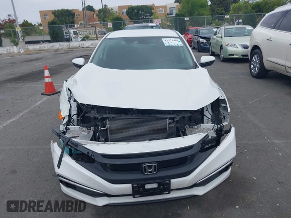 2020 Honda Civic LX z VIN 19XFC2F67LE212561, wystawiony jako IAAI lot #42272481 z przebiegiem 50 681 mil mil oraz . Historia ofert i sprzedaży dostępna na DreamBid. Obrazek 13.