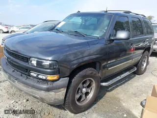 2003 Chevrolet Tahoe LS with VIN 1GNEC13ZX3R209167, listed as a IAAI auction lot 41496637 with 325,006 mi miles. Bid and sale history available at carsss.com. Image 2.