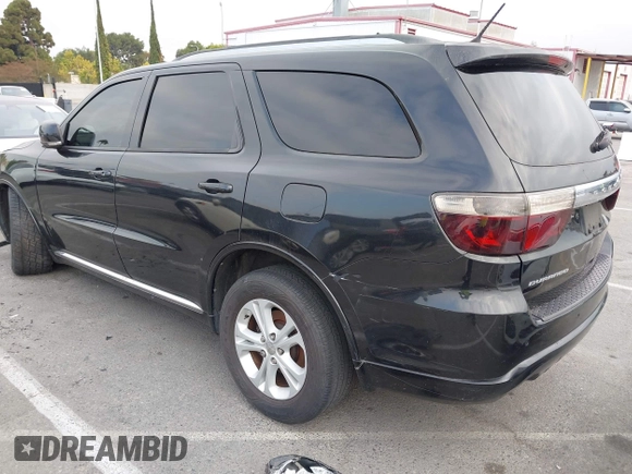 2012 Dodge Durango Crew with VIN 1C4SDHDT0CC321037, listed as a IAAI auction lot 42793232 with 162,593 mi miles and . Bid and sale history available at DreamBid. Image 3.