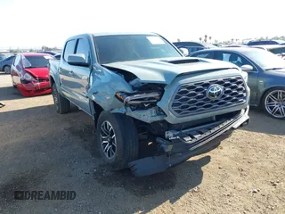 2023 Toyota Tacoma SR with VIN 3TYCZ5AN8PT157135, listed as a IAAI auction lot 42391046 with 20,115 mi miles and . Bid and sale history available at DreamBid. Image 1.