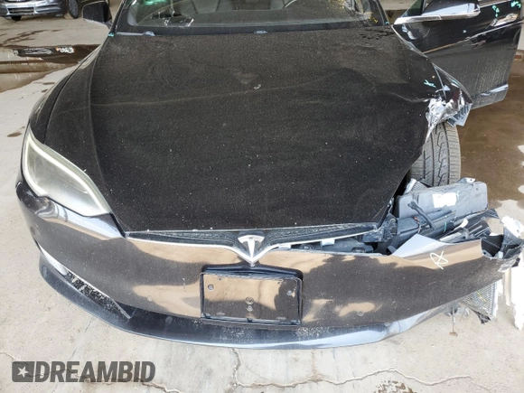 2018 Tesla Model S 75D with VIN 5YJSA1E27JF264759, listed as a Copart auction lot 59610855 with 104,375 mi miles and Salvage title. Bid and sale history available at DreamBid. Image 11.