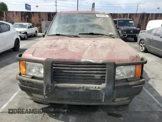 1996 Land Rover Range Rover z VIN SALPV144XTA333588, wystawiony jako Copart lot #65445765 z przebiegiem Nie podano mil oraz Czysty tytuł • Clean title. Historia ofert i sprzedaży dostępna na DreamBid. Obrazek 5.