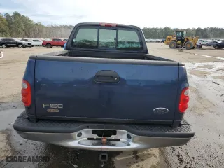 2003 Ford F-150 XL with VIN 1FTRX07273KB66549, listed as a Copart auction lot 83552004 with 205,026 mi miles and Salvage Title. Bid and sale history available at carsss.com. Image 6.