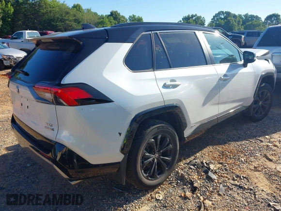 2023 Toyota RAV4 Hybrid XSE with VIN 2T3E6RFV1PW038080, listed as a IAAI auction lot 42518107 with 14,430 mi miles and . Bid and sale history available at DreamBid. Image 4.