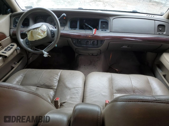 2003 Mercury Grand Marquis GS Convenience z VIN 2MEFM74W53X702387, wystawiony jako Copart lot #52852475 z przebiegiem 246 543 mil mil oraz Szkoda całkowita • Salvage title. Historia ofert i sprzedaży dostępna na DreamBid. Obrazek 8.