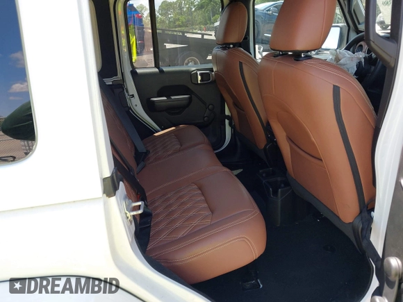 2023 Jeep Wrangler Willys with VIN 1C4HJXDN1PW546425, listed as a IAAI auction lot 42503380 with 25,245 mi miles and . Bid and sale history available at DreamBid. Image 8.