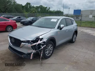 2023 Mazda CX-5 S Carbon Edition z VIN JM3KFBCM3P0197796, wystawiony jako IAAI lot #42408301 z przebiegiem 46 169 mil mil oraz . Historia ofert i sprzedaży dostępna na DreamBid. Obrazek 17.