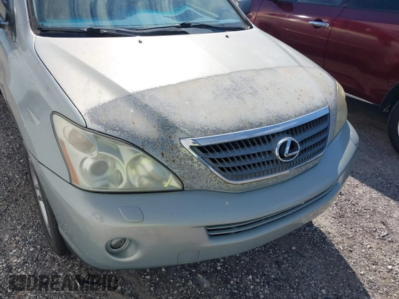 2007 Lexus RX 400h z VIN JTJGW31U272002926, wystawiony jako IAAI lot #41792083 z przebiegiem 227 063 mil mil oraz . Historia ofert i sprzedaży dostępna na DreamBid. Obrazek 6.