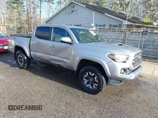2016 Toyota Tacoma SR with VIN 3TMCZ5AN9GM001620, listed as a IAAI auction lot 41902924 with 117,462 mi miles. Bid and sale history available at carsss.com. Image 1.