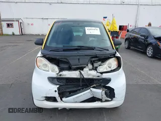 2008 Smart fortwo Pure z VIN WMEEJ31X18K126191, wystawiony jako IAAI lot #42045070 z przebiegiem 149 361 mil mil oraz . Historia ofert i sprzedaży dostępna na DreamBid. Obrazek 13.
