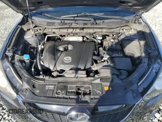 2014 Mazda CX-5 Grand Touring with VIN JM3KE2DY4E0323603, listed as a Copart auction lot 49884835 with 0 mi miles and Salvage Title. Bid and sale history available at carsss.com. Image 13.