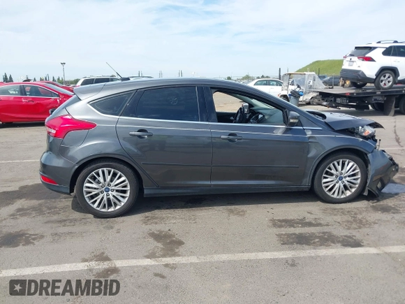 2018 Ford Focus Titanium with VIN 1FADP3N23JL241453, listed as a IAAI auction lot 42025190 with 90,174 mi miles and . Bid and sale history available at DreamBid. Image 13.