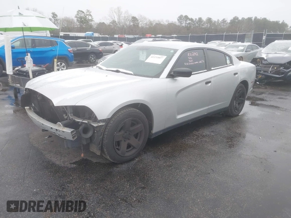 2014 Dodge Charger Police with VIN 2C3CDXAG1EH282873, listed as a IAAI auction lot 41272037 with 133,502 mi miles and . Bid and sale history available at DreamBid. Image 2.