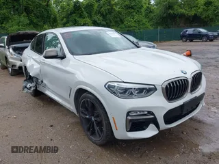 2019 BMW X4 M40i z VIN 5UXUJ5C5XKLJ64164, wystawiony jako IAAI lot #42329392 z przebiegiem 59 408 mil mil oraz . Historia ofert i sprzedaży dostępna na DreamBid. Obrazek 1.