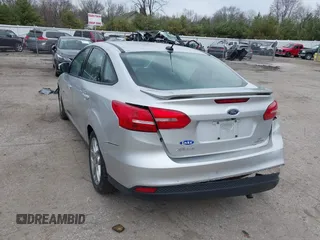2015 Ford Focus SE with VIN 1FADP3F24FL347206, listed as a IAAI auction lot 41941987 with 96,473 mi miles and . Bid and sale history available at DreamBid. Image 3.