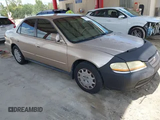 2001 Honda Accord LX with VIN 1HGCG56411A137381, listed as a IAAI auction lot 42540844 with 156,060 mi miles and . Bid and sale history available at DreamBid. Image 1.