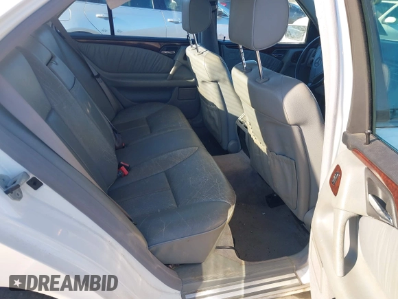 1999 Mercedes-Benz E-Class with VIN WDBJF82H0XX015778, listed as a IAAI auction lot 41269886 with 184,011 mi miles. Bid and sale history available at carsss.com. Image 8.