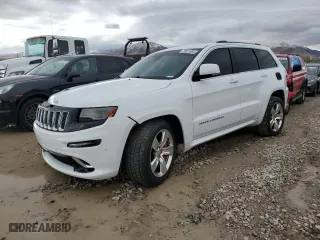 2015 Jeep Grand Cherokee SRT with VIN 1C4RJFDJ8FC919486, listed as a Copart auction lot 76821994 with 114,944 mi miles and Salvage Title. Bid and sale history available at carsss.com. Image 1.