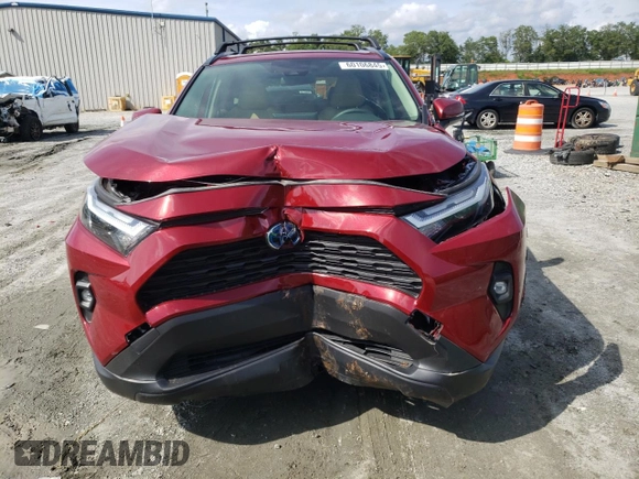2023 Toyota RAV4 Hybrid XLE Premium with VIN JTMB6RFV2PD541262, listed as a Copart auction lot 60106845 with 32,447 mi miles and Salvage title. Bid and sale history available at DreamBid. Image 5.