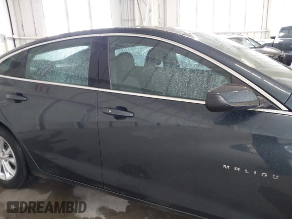 2020 Chevrolet Malibu LT with VIN 1G1ZD5STXLF052438, listed as a IAAI auction lot 42006000 with 140,513 mi miles and . Bid and sale history available at DreamBid. Image 13.