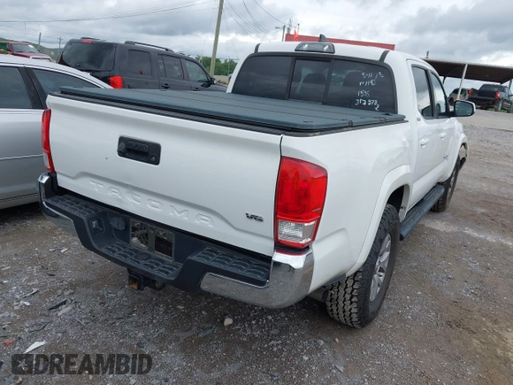 2017 Toyota Tacoma SR5 z VIN 3TMAZ5CN8HM051558, wystawiony jako IAAI lot #42320319 z przebiegiem 101 767 mil mil oraz . Historia ofert i sprzedaży dostępna na DreamBid. Obrazek 4.
