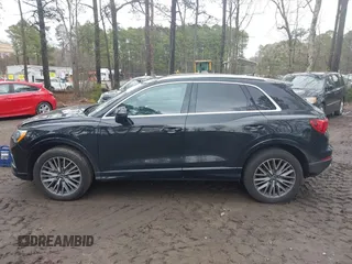2021 Audi Q3 Premium with VIN WA1AUCF34M1148531, listed as a IAAI auction lot 41815286 with 31,934 mi miles and . Bid and sale history available at DreamBid. Image 14.