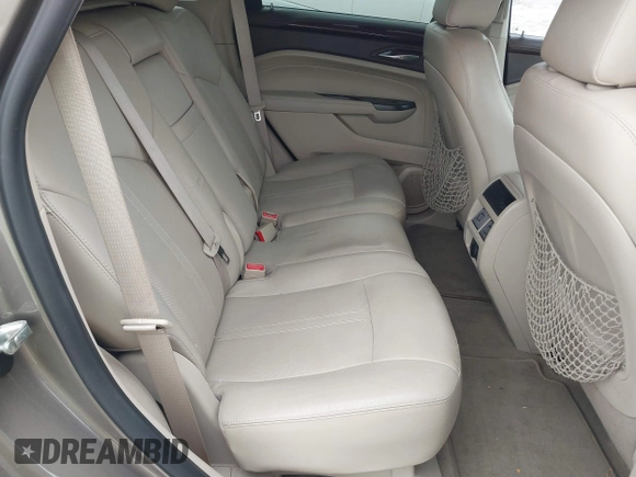 2012 Cadillac SRX Luxury Collection z VIN 3GYFNAE35CS509402, wystawiony jako IAAI lot #41765970 z przebiegiem 157 082 mil mil oraz . Historia ofert i sprzedaży dostępna na DreamBid. Obrazek 8.