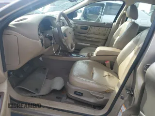 2003 Ford Taurus SEL Deluxe with VIN 1FAHP56SX3A243775, listed as a Copart auction lot 72245394 with 251,041 mi miles and Salvage Title. Bid and sale history available at DreamBid. Image 7.