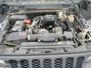 2020 Jeep Gladiator Sport S z VIN 1C6HJTAG6LL193553, wystawiony jako Copart lot #55638915 z przebiegiem 84 600 mil mil oraz Szkoda całkowita • Salvage title. Historia ofert i sprzedaży dostępna na DreamBid. Obrazek 11.