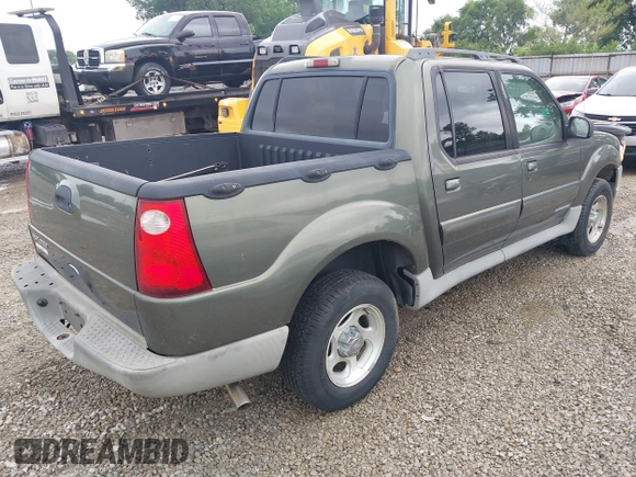 2002 Ford Explorer Sport Trac Value z VIN 1FMZU77E42UC02871, wystawiony jako IAAI lot #42470829 z przebiegiem 151 070 mil mil oraz . Historia ofert i sprzedaży dostępna na DreamBid. Obrazek 4.