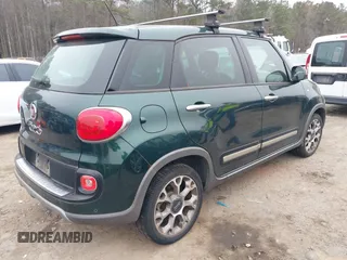 2014 FIAT 500L Trekking with VIN ZFBCFADH5EZ017349, listed as a IAAI auction lot 41528462 with 119,820 mi miles and . Bid and sale history available at DreamBid. Image 4.