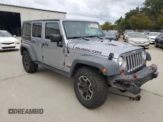 2013 Jeep Wrangler Unlimited Rubicon 10th Anniversary z VIN 1C4HJWFG3DL703331, wystawiony jako Copart lot #70823154 z przebiegiem 148 860 mil mil oraz Szkoda całkowita • Salvage title. Historia ofert i sprzedaży dostępna na DreamBid. Obrazek 4.