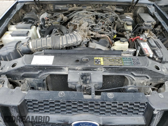 2005 Ford Explorer Sport Trac XLS z VIN 1FMZU67K15UB77562, wystawiony jako Copart lot #59619895 z przebiegiem 122 810 mil mil oraz Szkoda całkowita • Salvage title. Historia ofert i sprzedaży dostępna na DreamBid. Obrazek 11.
